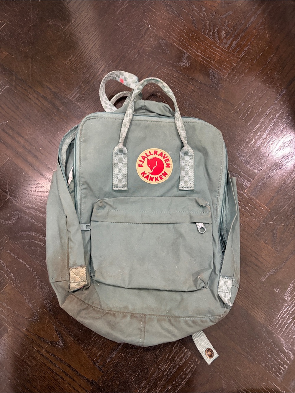 Fjallraven Kånken Backpack in Sage Green with Red Logo